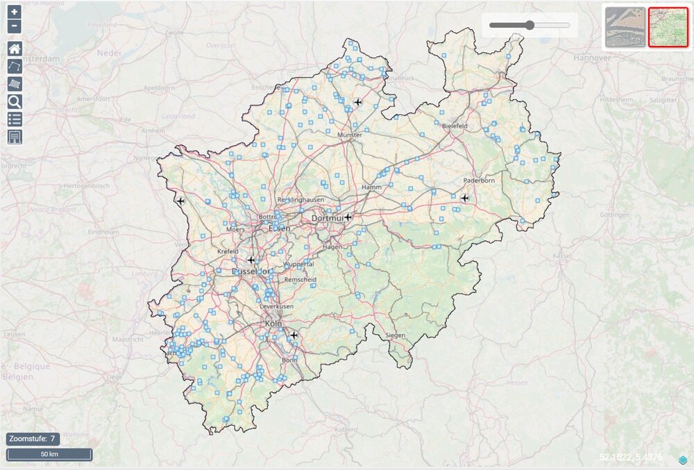 Map of North Rhine-Westphalia showing towns, roads and markers for commercial areas.