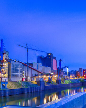 Duisburg Inner Harbour promenade with Museum Küppersmühle in the Lower Rhine region.